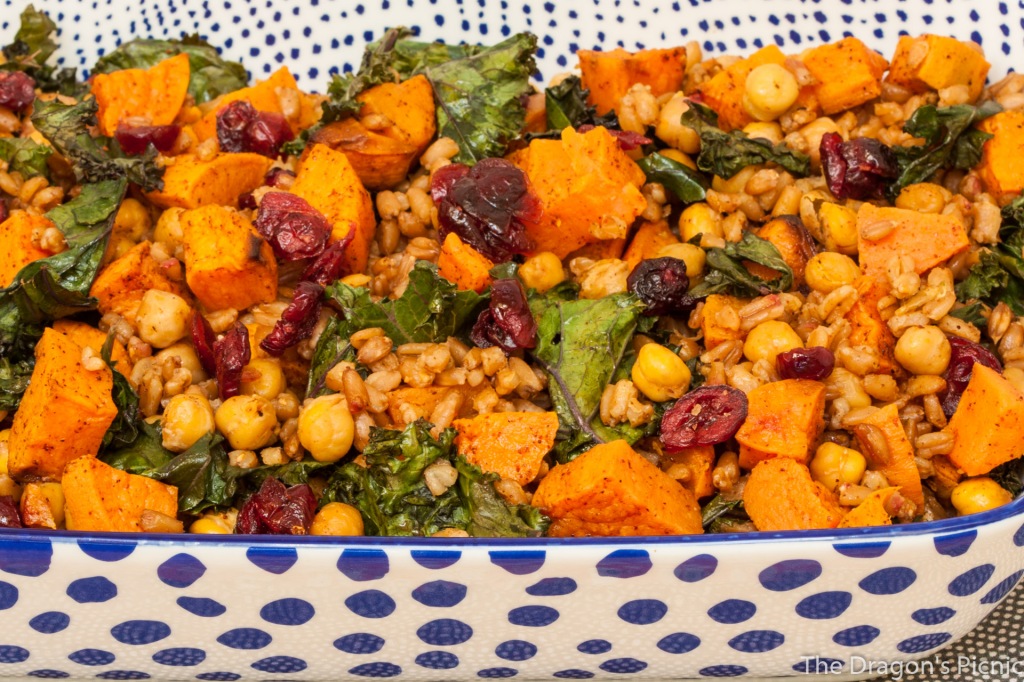 serving dish with farro, kale and roasted sweet potato salad 